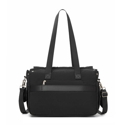 Front view of black textured nylon diaper bag with horizontal zippered pocket and reinforced corners