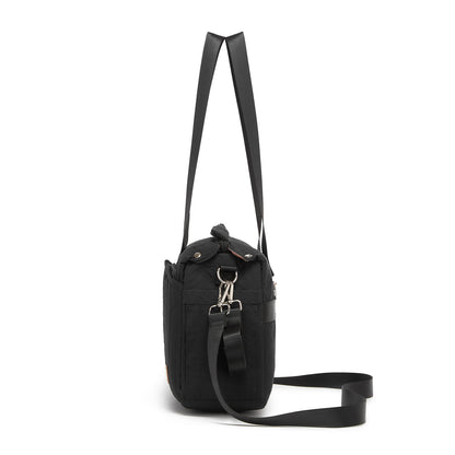 Side profile of structured black diaper bag showing side zipper pocket and detachable strap