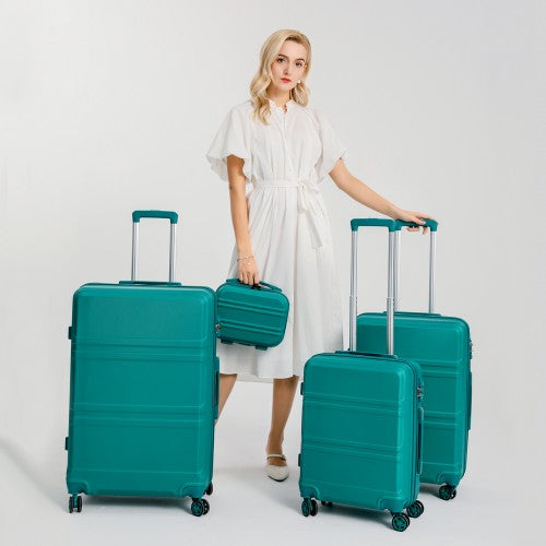 Teal Kono ABS suitcase set held by woman in studio showing matte finish and ribbed texture