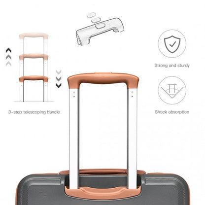 Dark gray textured suitcase copper-toned telescoping handle ergonomic grip detail