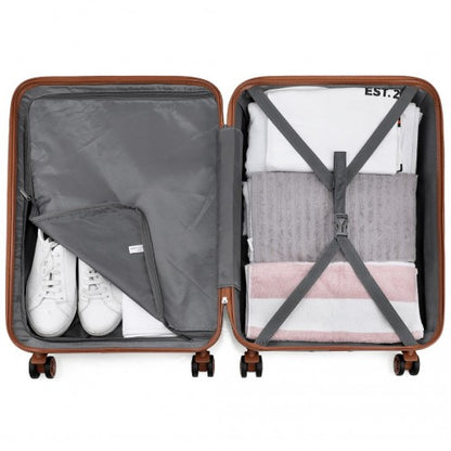 Packed brown KONO suitcase interior with compression straps holding sneakers and towels for travel organization