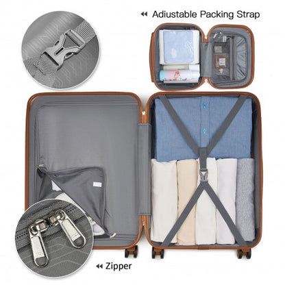 Brown-trimmed suitcase interior with X-config adjustable packing strap and zipper detail