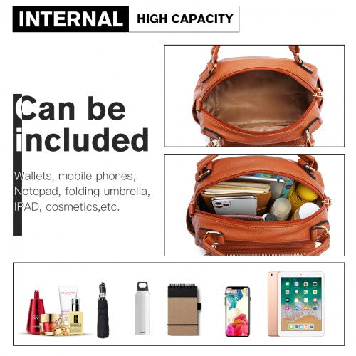 Open brown bowler bag interior showing high capacity lining for phone, wallet, umbrella, and cosmetics