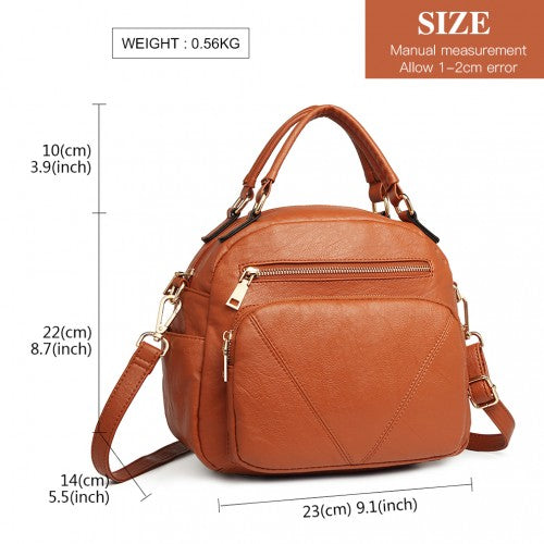 Brown structured bowler bag showing 23cm width dimensions, top handles, and adjustable strap details