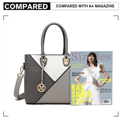 Gray and white geometric Miss Lulu handbag size comparison next to A4 magazine